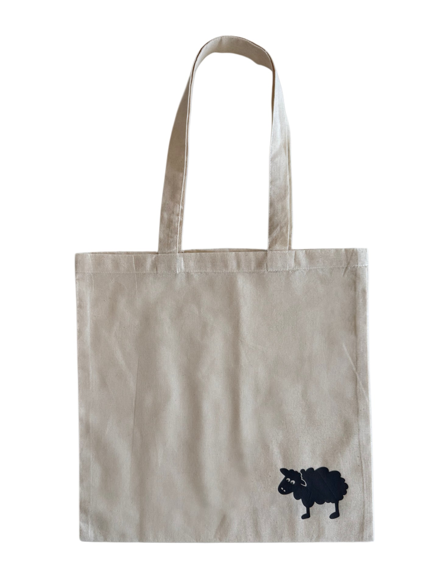 Canvas tote bag with black sheep logo in corner