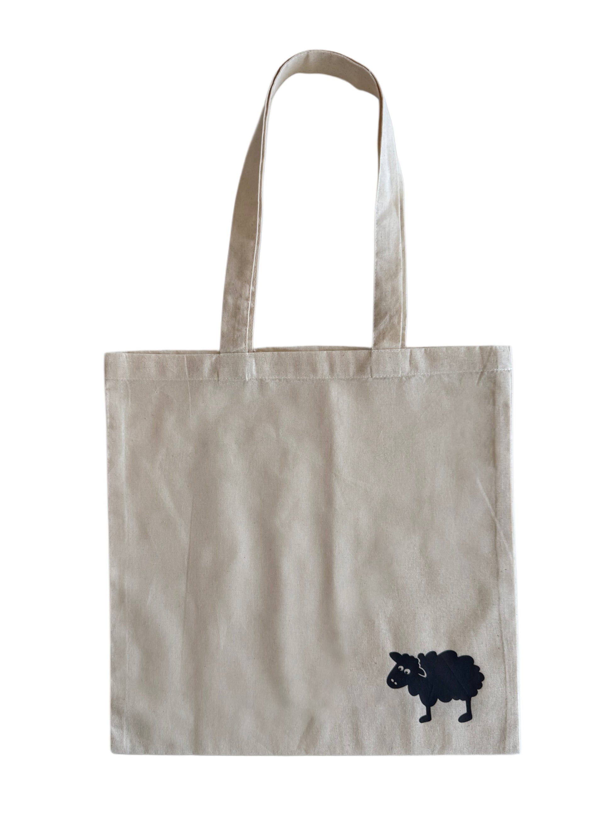 Canvas tote bag with black sheep logo in corner
