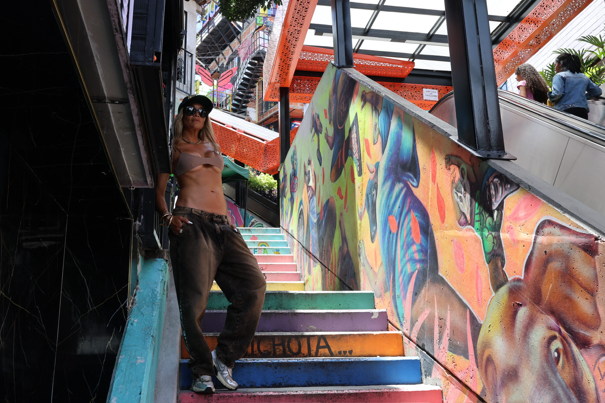 BAndida Top outfit on Medellin rainbow stairs, tiny minimal swim top.