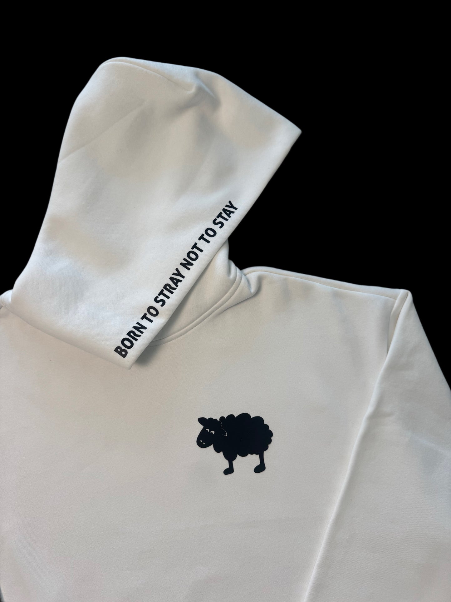 Close-up of hood with Born to Stray Not to Stay text and black sheep logo