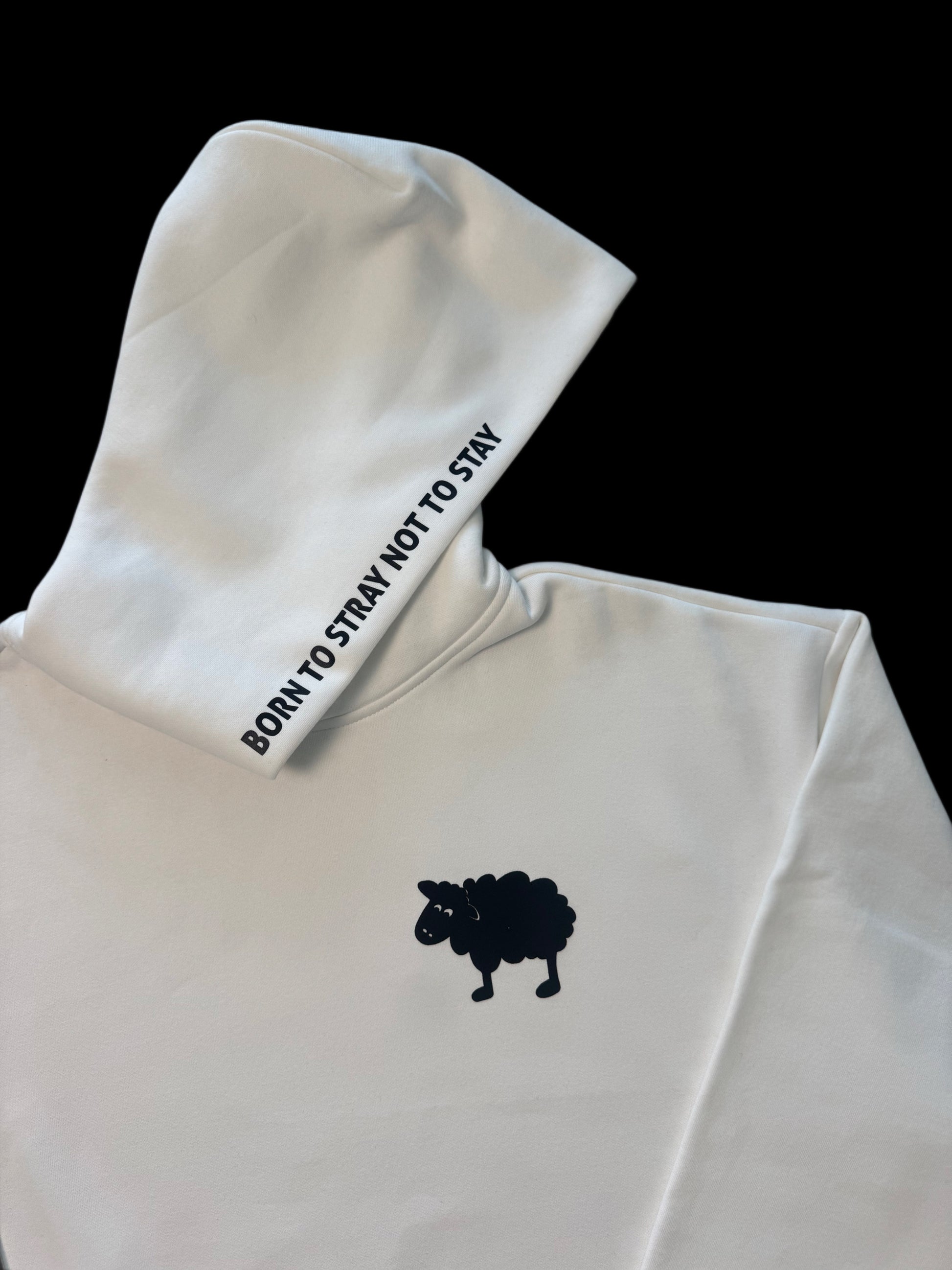Close-up of hood with Born to Stray Not to Stay text and black sheep logo
